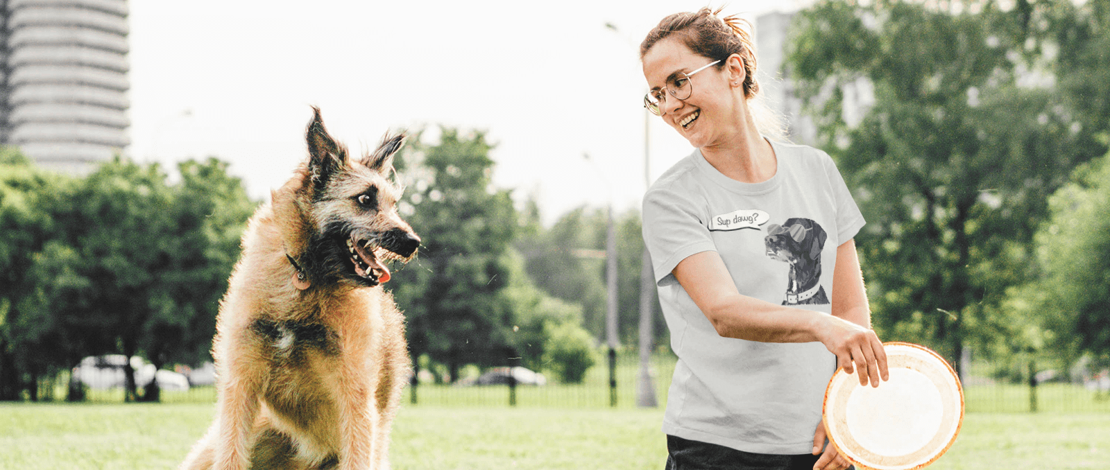 t-shirt-mockup-of-a-happy-woman-playing-with-her-dog-at-a-park-45251-r-el2-min